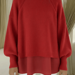 Layered-look women's sweater by THE WHITMORE FAMILY, featuring a stylish multi-layered design and cozy knit fabric.