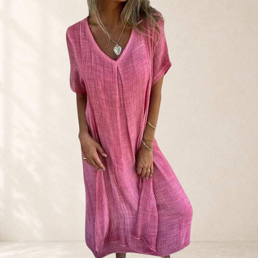 Fiona™ lightweight V-neck dress by THE WHITMORE FAMILY, elegant and flowing with a fitted waist and short sleeves.