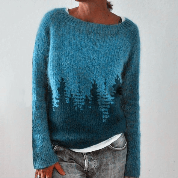 Nevaeh retro Scandinavian knitted sweater by THE WHITMORE FAMILY, featuring colorful geometric patterns and cozy knit texture.