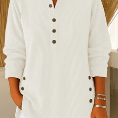 Button Henley tunic sweater for women by THE WHITMORE FAMILY featuring a casual, comfortable design with a buttoned neckline.
