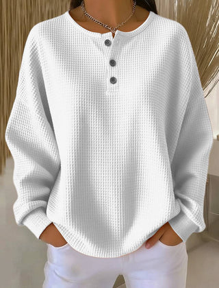 Women’s cozy waffle henley sweatshirt by THE WHITMORE FAMILY, featuring a relaxed fit and buttoned placket in soft fabric.