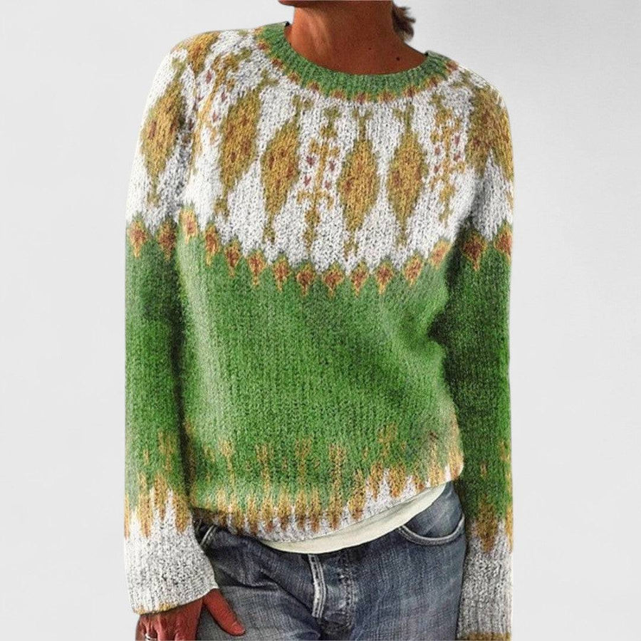 Linda retro Scandinavian knitted sweater by THE WHITMORE FAMILY, featuring colorful geometric patterns and cozy wool texture.