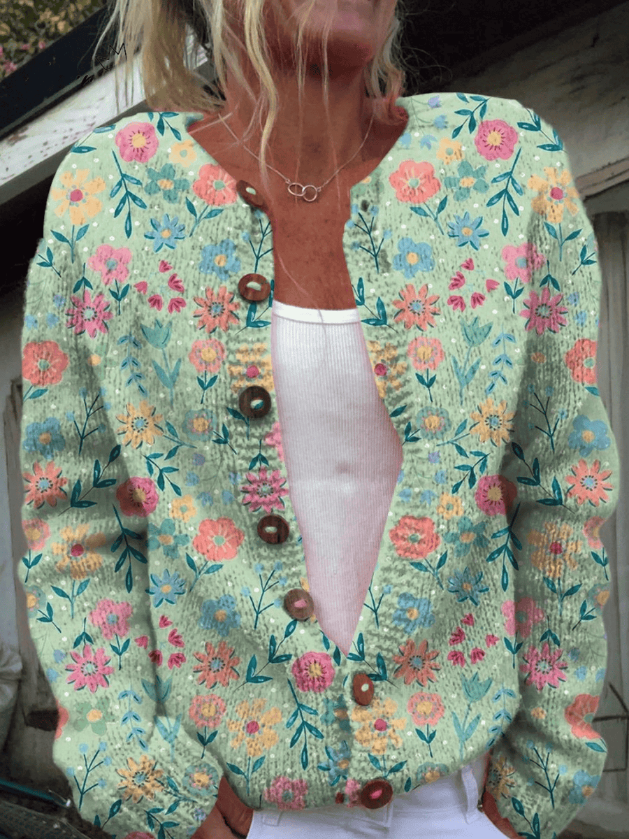 Women's vintage floral cardigan from Foxfield™ by THE WHITMORE FAMILY, featuring a colorful floral pattern and cozy knit fabric.