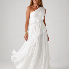 Talia cascading ruffle maxi dress by THE WHITMORE FAMILY, flowing fabric with layered ruffles, elegant and stylish for formal occasions.