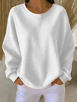 Women’s classic sweater jumper by THE WHITMORE FAMILY, featuring a cozy knit design and a relaxed fit.