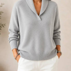 Soft V-neck women's sweater by THE WHITMORE FAMILY, featuring a cozy knit fabric and a stylish V-neck design.