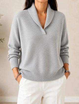 Soft V-neck women's sweater by THE WHITMORE FAMILY, featuring a cozy knit fabric and a stylish V-neck design.