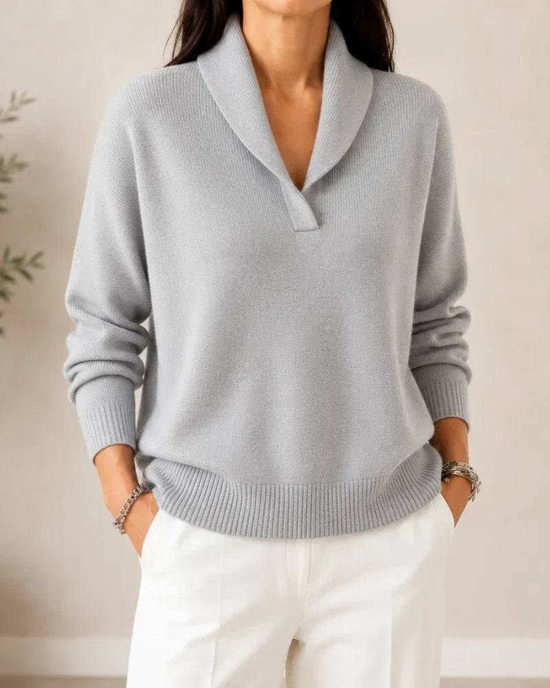 Soft V-neck women's sweater by THE WHITMORE FAMILY, featuring a cozy knit fabric and a stylish V-neck design.