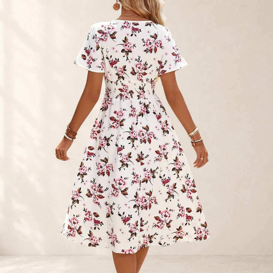 Gretalise comfortable summer midi dress by THE WHITMORE FAMILY, featuring a flowy design and lightweight fabric.