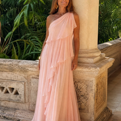 Talia cascading ruffle maxi dress by THE WHITMORE FAMILY featuring flowing fabric and layered ruffles for an elegant look.