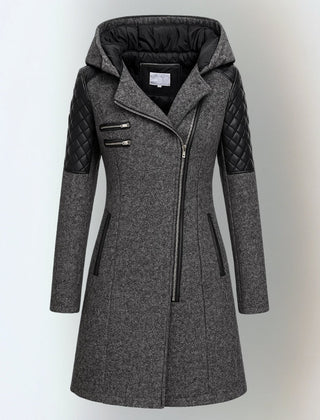 Katrin™ winter jacket by THE WHITMORE FAMILY, elegant and warm with a stylish design, shown in a cozy outdoor setting.
