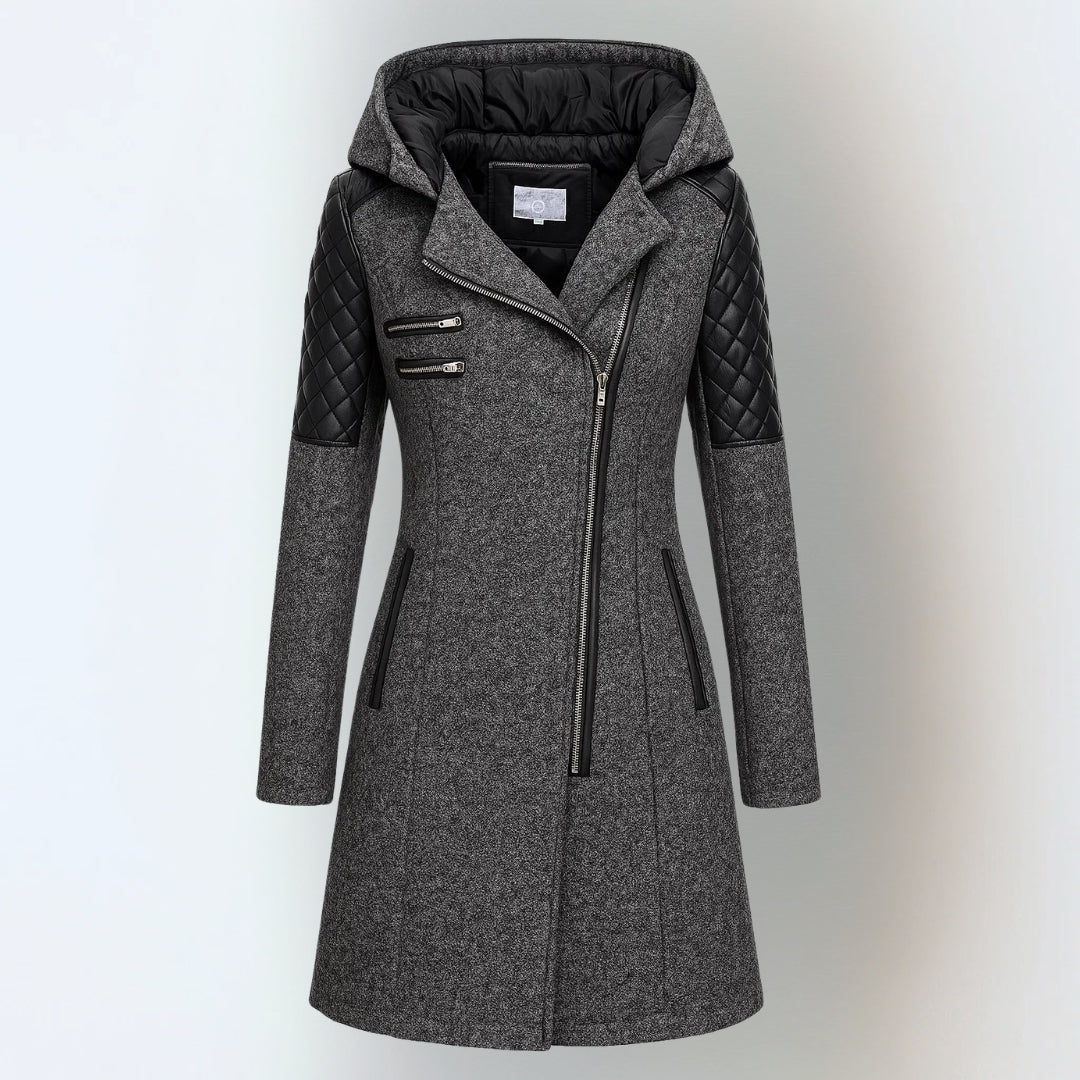 Katrin™ winter jacket by THE WHITMORE FAMILY, elegant and warm with a stylish design, shown in a cozy outdoor setting.