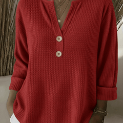 Women’s Henley button sweater by THE WHITMORE FAMILY, featuring a cozy knit fabric and classic henley neckline.
