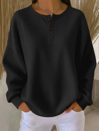 Cosy waffle henley sweatshirt for women by THE WHITMORE FAMILY, featuring a textured waffle fabric and henley neckline.