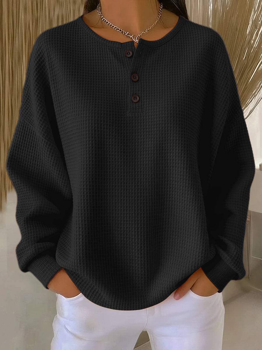 Cosy waffle henley sweatshirt for women by THE WHITMORE FAMILY, featuring a textured waffle fabric and henley neckline.