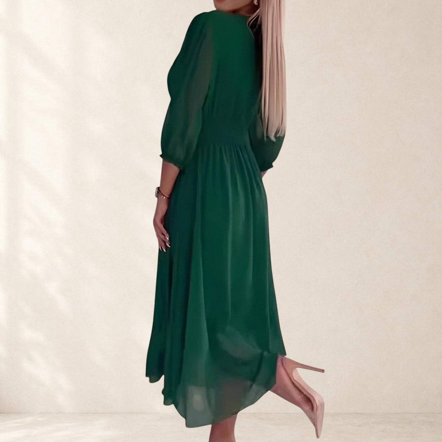 Chloe lightweight silky chiffon dress from THE WHITMORE FAMILY featuring a flowing, elegant design in soft pastel tones.