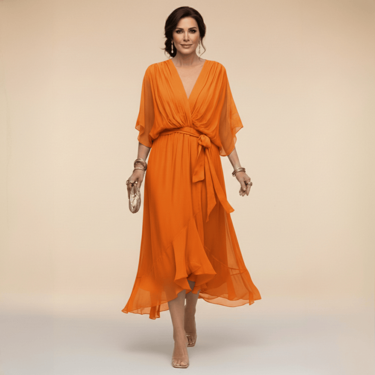 Mona V-neck dress by THE WHITMORE FAMILY featuring a stylish, flowy design in a flattering silhouette.