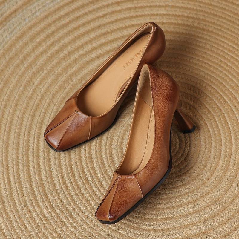 Marisol leather square-toe pumps by THE WHITMORE FAMILY featuring sleek design and classic style in neutral leather.
