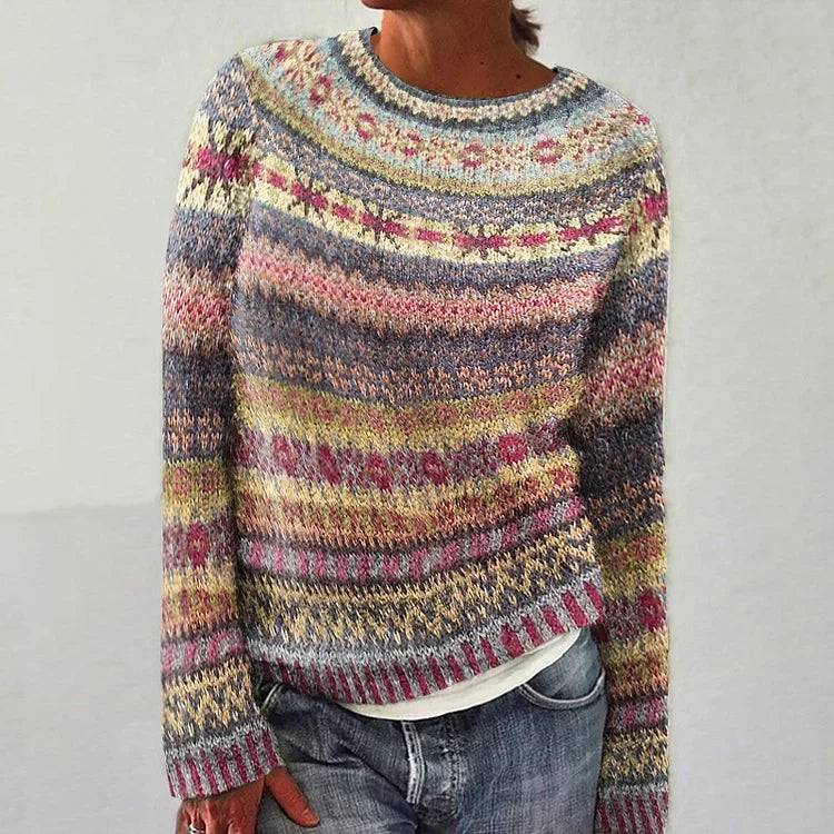 Loretta retro Scandinavian knitted sweater by THE WHITMORE FAMILY, featuring colorful geometric patterns and cozy knit texture.