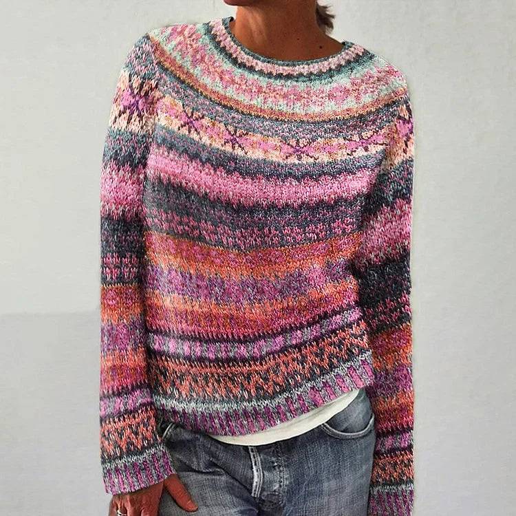 Scandinavian knitted sweater by THE WHITMORE FAMILY featuring retro design, cozy fit, and intricate knit pattern in warm tones.