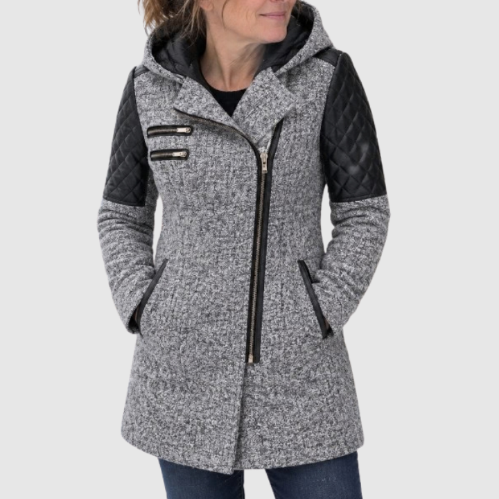 Katrin™ winter jacket by THE WHITMORE FAMILY, showcasing a warm, elegant coat with a fur-lined hood and stylish design.