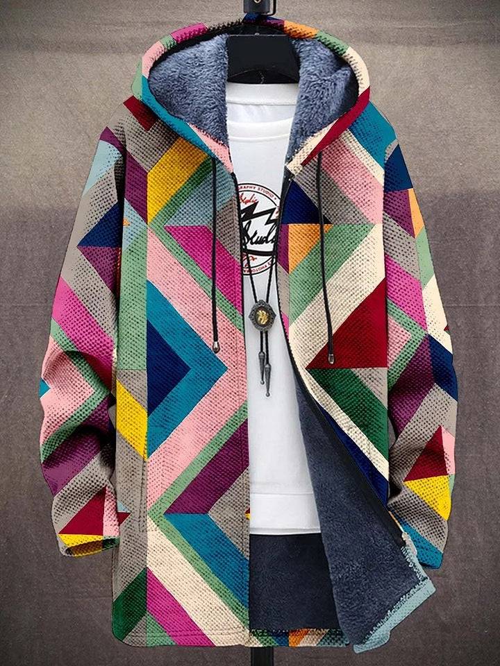 Luxe art-inspired cardigan by THE WHITMORE FAMILY featuring a stylish design, worn as a vest in a vibrant, artistic style.