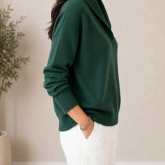 Soft V-neck sweater for women by THE WHITMORE FAMILY, featuring a cozy fit and classic design in a neutral color.