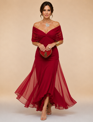 Elegant maxi party dress named Emma by THE WHITMORE FAMILY, shown in a stylish design perfect for formal occasions.