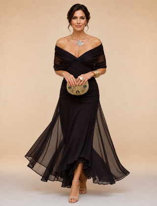 Elegant Emma maxi party dress by THE WHITMORE FAMILY, featuring flowing fabric and stylish design perfect for special occasions.