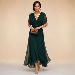 Elegant Emma maxi party dress by THE WHITMORE FAMILY, featuring flowing fabric and stylish design, perfect for special occasions.