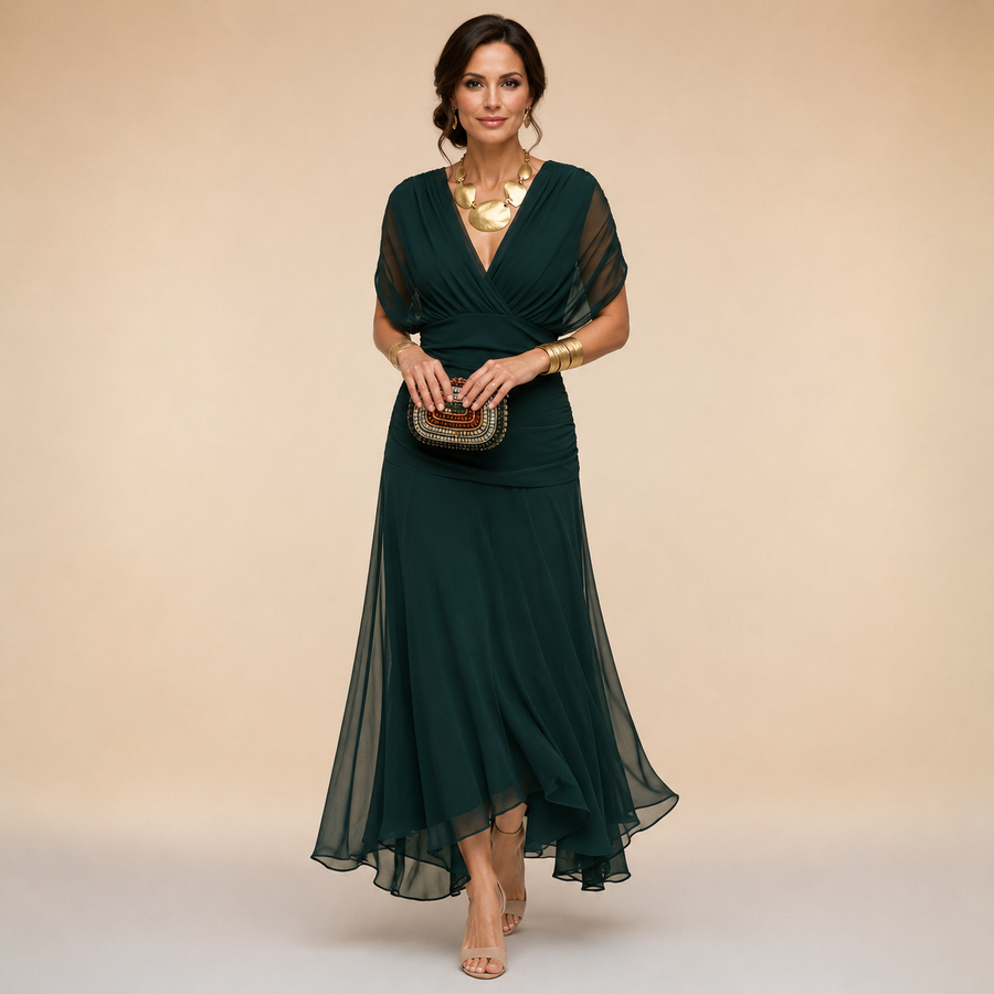Elegant Emma maxi party dress by THE WHITMORE FAMILY, featuring flowing fabric and stylish design, perfect for special occasions.