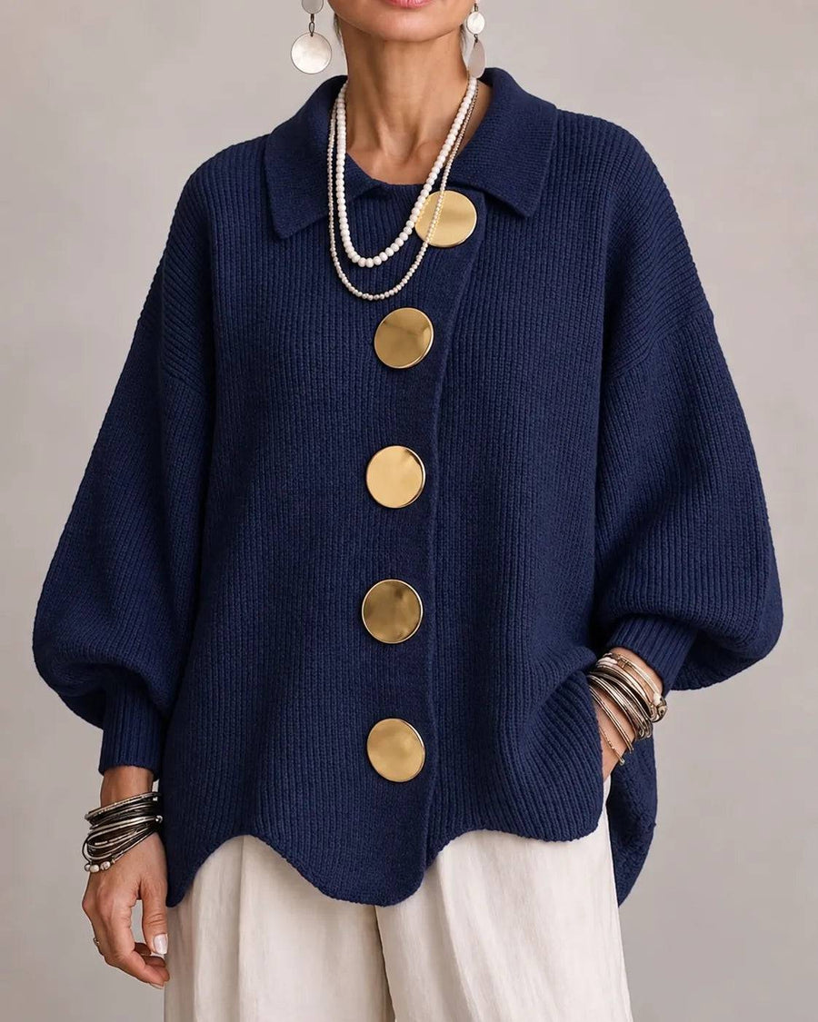 Olive green oversized button-knit cardigan by THE WHITMORE FAMILY, featuring large buttons and a cozy, chunky knit texture