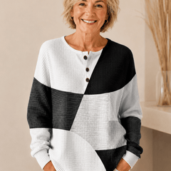 Women's Classic Comfort Jumper sweater by THE WHITMORE FAMILY, featuring a cozy knit design in neutral tones.