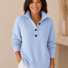 V-neck polo jumper for women by THE WHITMORE FAMILY, soft knit sweater with a classic V-neck design and ribbed cuffs.