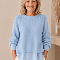 Layered-look women's sweater by THE WHITMORE FAMILY featuring a cozy, stylish design with multiple fabric layers and a relaxed fit.