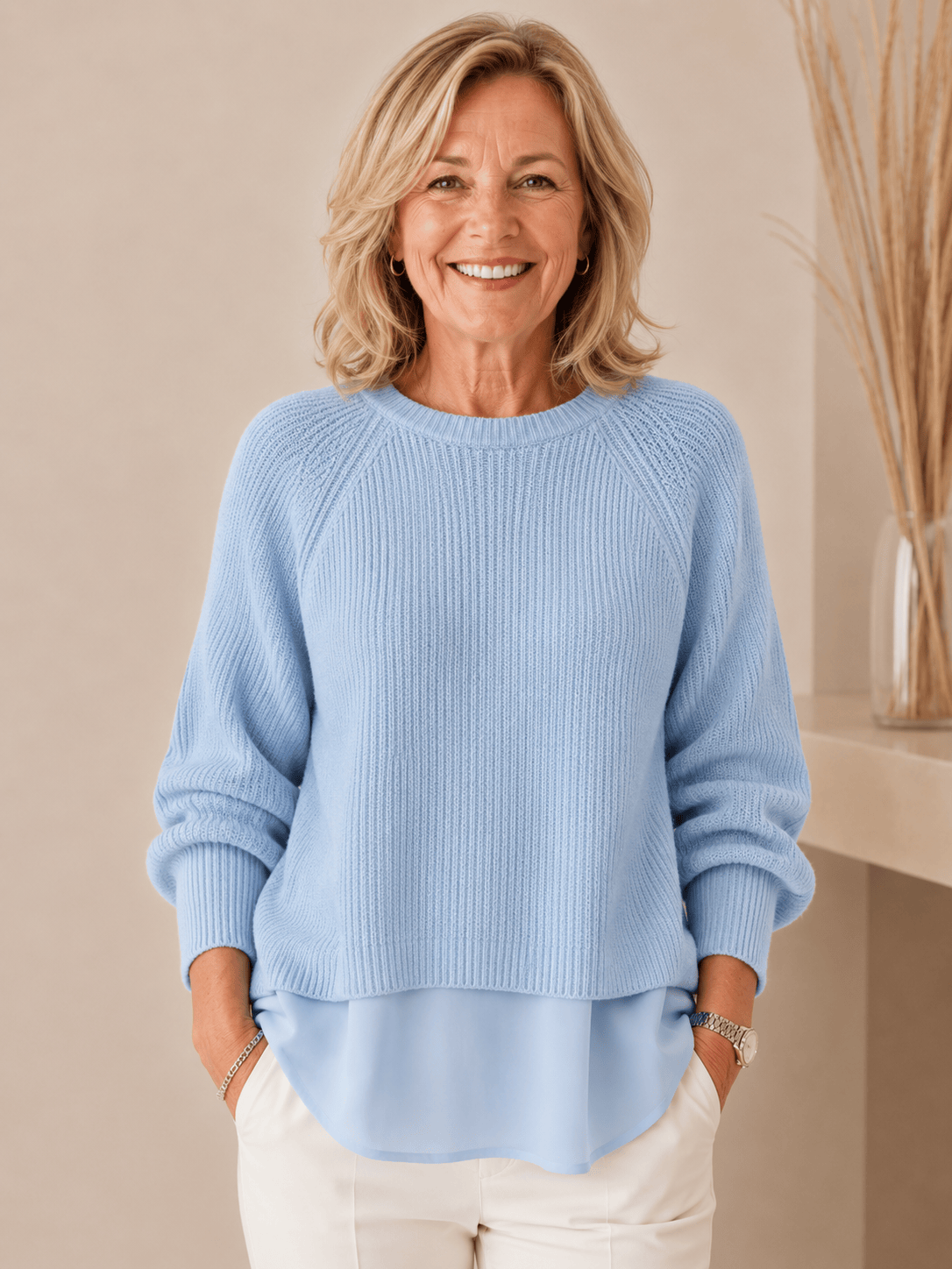 Layered-look women's sweater by THE WHITMORE FAMILY featuring a cozy, stylish design with multiple fabric layers and a relaxed fit.