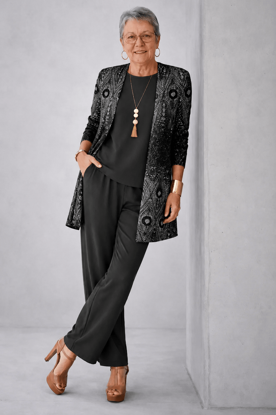 Classic three-piece trouser set for women by THE WHITMORE FAMILY, featuring tailored pants, blazer, and shirt in neutral tones.