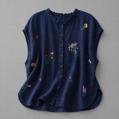 Jasmine cotton linen blouse by THE WHITMORE FAMILY, featuring lightweight, breathable fabric with a relaxed fit and button front.