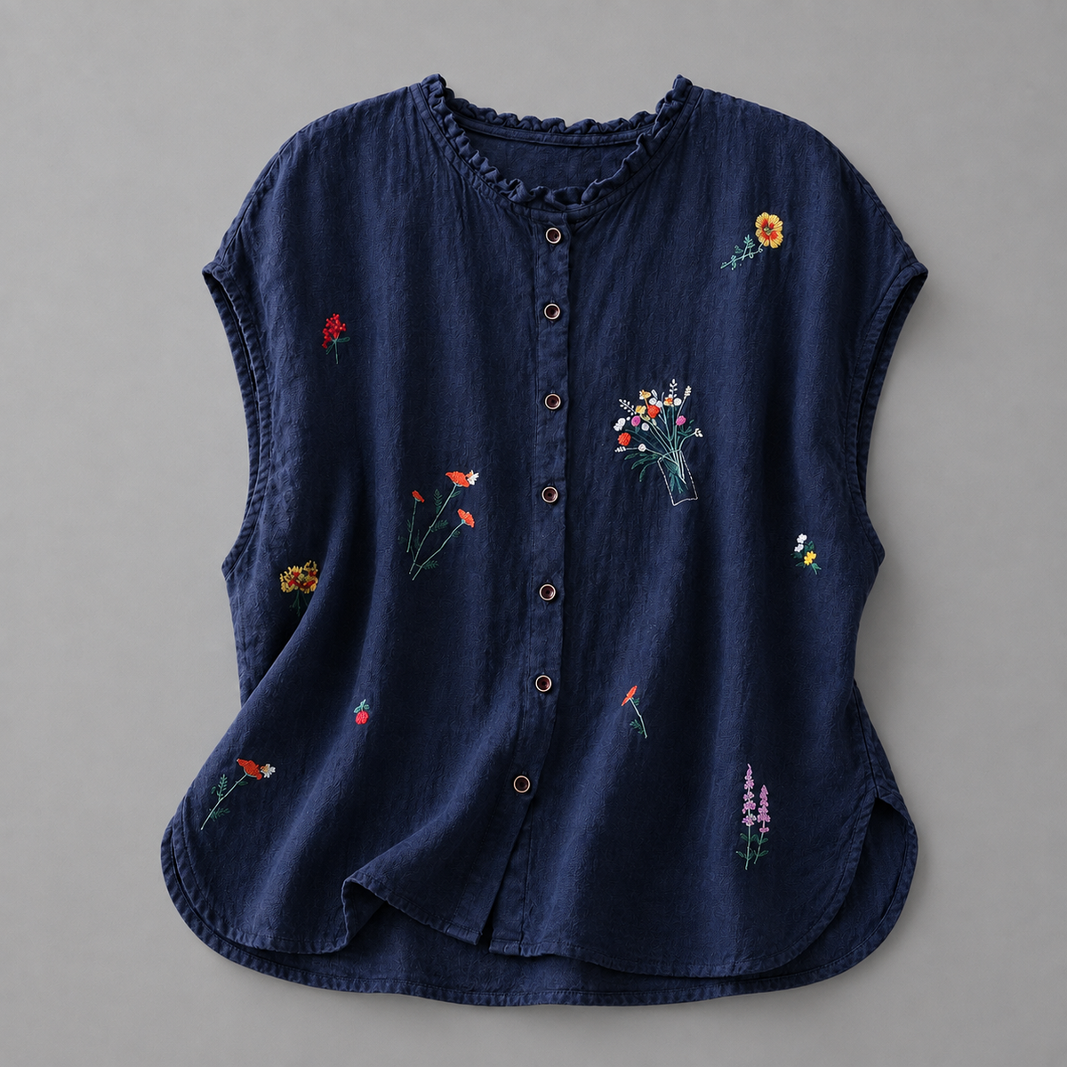 Jasmine cotton linen blouse by THE WHITMORE FAMILY, featuring lightweight, breathable fabric with a relaxed fit and button front.