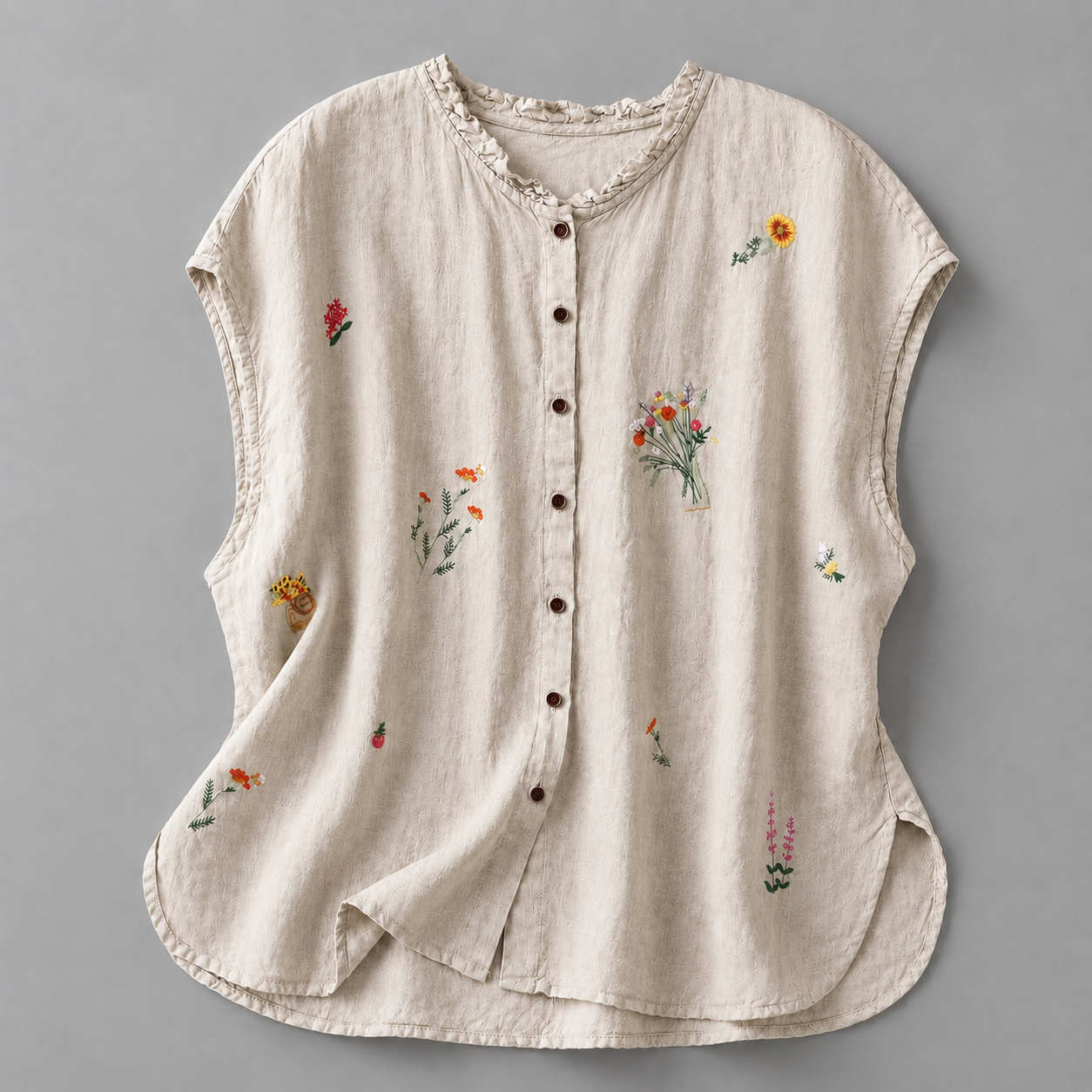 Jasmine cotton linen blouse by THE WHITMORE FAMILY, featuring a relaxed fit with delicate fabric and stylish design.