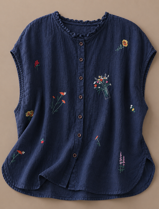 Jasmine cotton linen blouse by THE WHITMORE FAMILY, featuring a lightweight, flowy design with a relaxed fit and natural fabric texture.