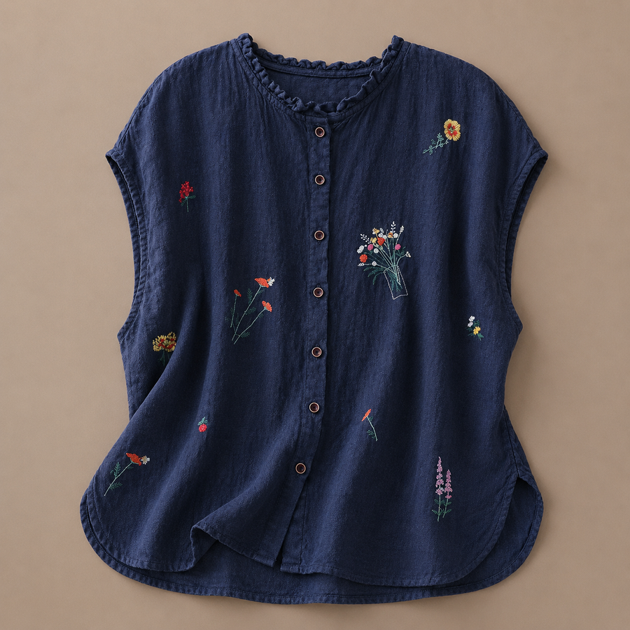 Jasmine cotton linen blouse by THE WHITMORE FAMILY, featuring a lightweight, flowy design with a relaxed fit and natural fabric texture.
