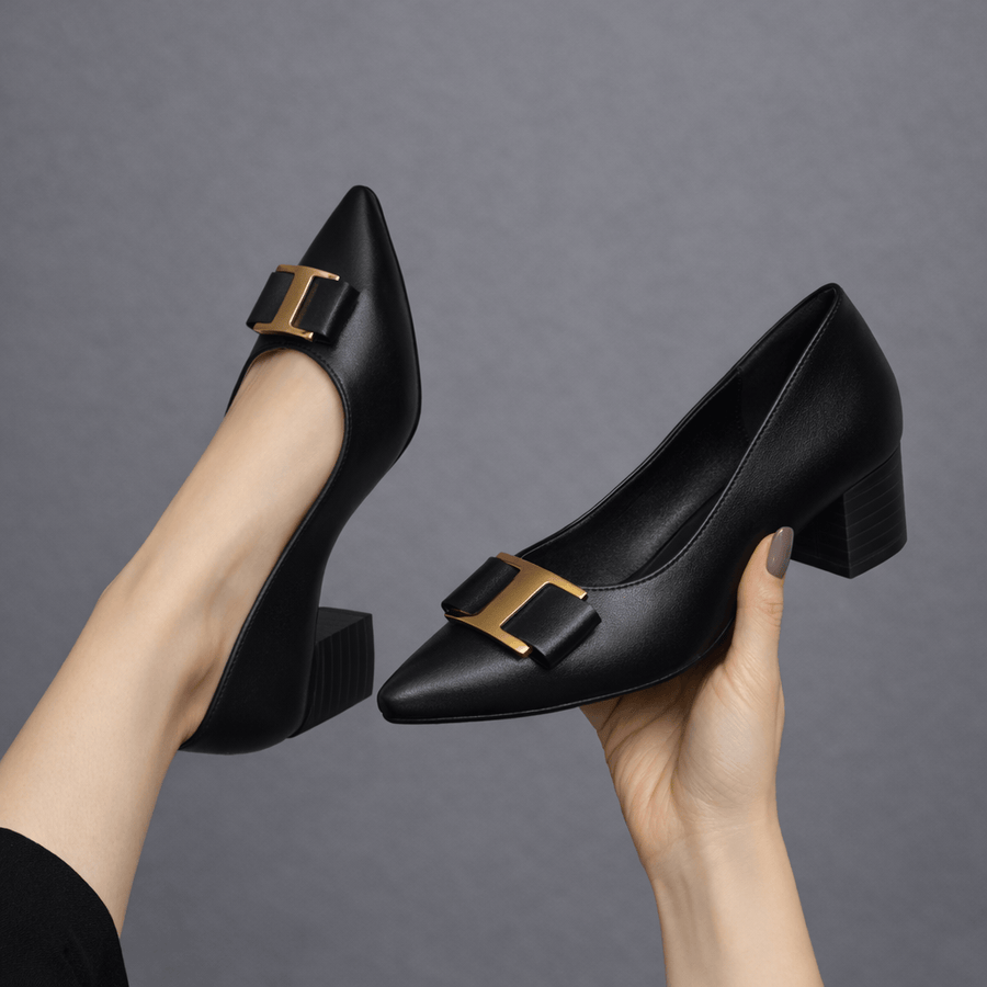 Stylish Lucia Heels by THE WHITMORE FAMILY featuring elegant pointed toes and sleek design, perfect for formal occasions.