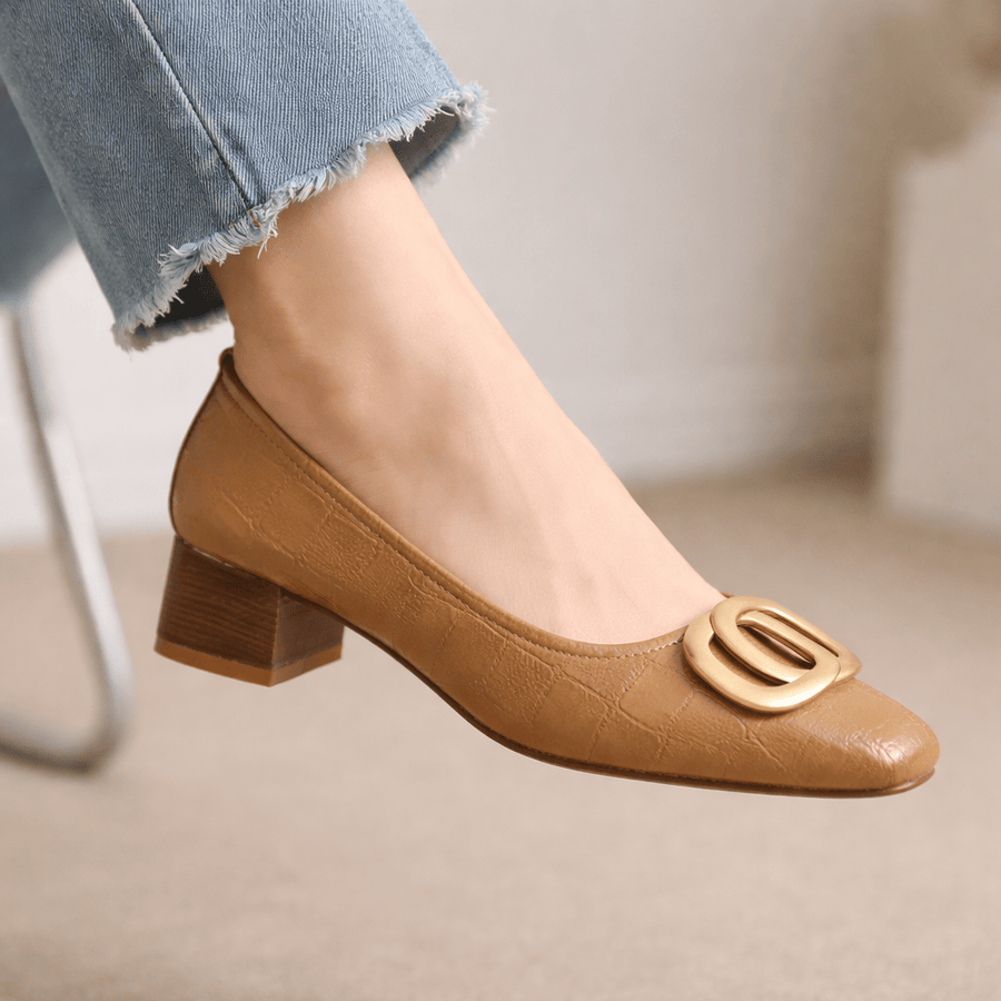 Elegant Opium Crest Heels by THE WHITMORE FAMILY featuring sleek black design and pointed toe for stylish formal wear.