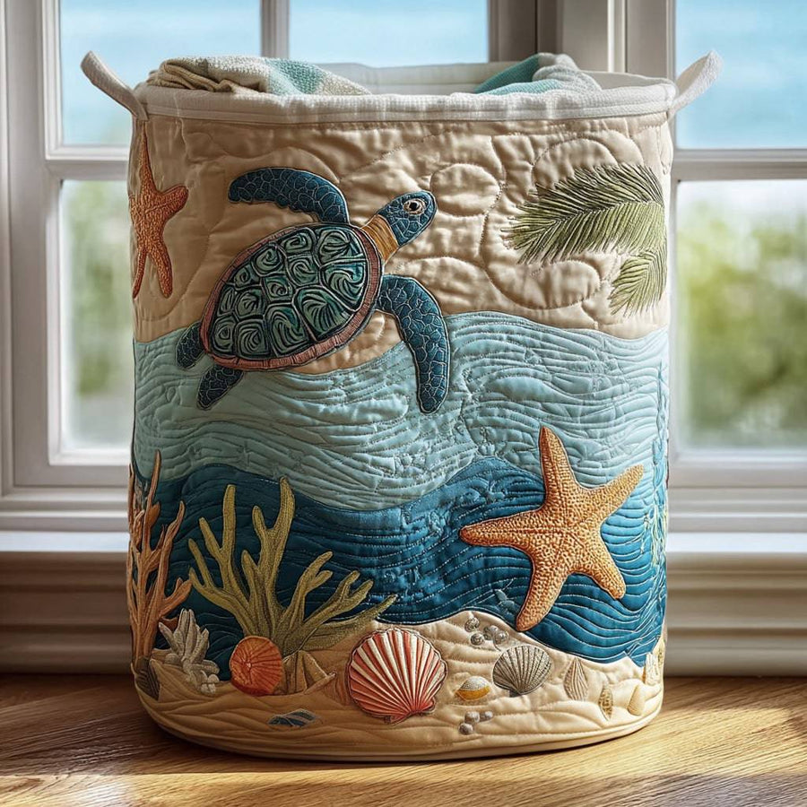 Coastal Harmony quilted laundry basket by THE WHITMORE FAMILY with a woven coastal design and soft fabric handles.