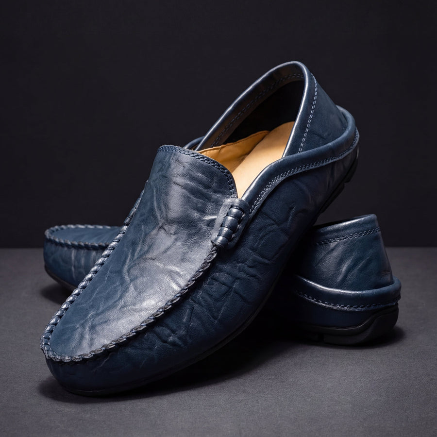 Florence leather loafers by THE WHITMORE FAMILY, classic mocassini style in smooth brown leather with stitching details.