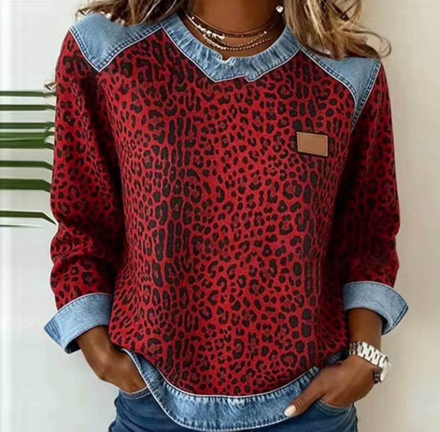 Hollyn™ leopard print sweater with denim collar by THE WHITMORE FAMILY, featuring a stylish animal print and contrasting collar detail.