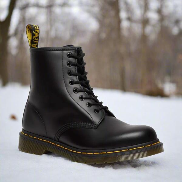 Elegant women lace-up boot by THE WHITMORE FAMILY featuring smooth leather and stylish design, shown in a close-up side view.