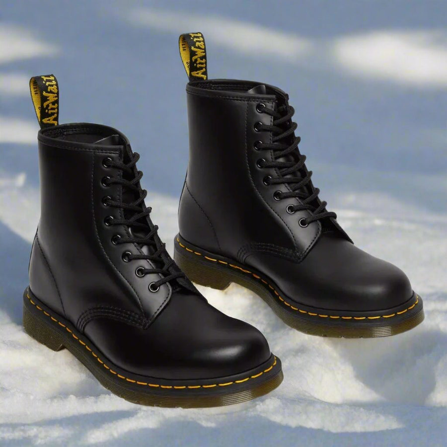 Elegant women lace-up boot by THE WHITMORE FAMILY, featuring stylish design and leather material, shown on a model.