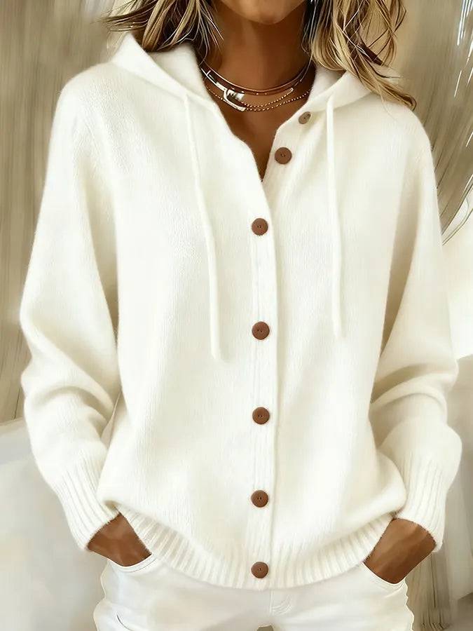 Melanie wearing the Brenda™ Cozy Button Cardigan Hoodie by THE WHITMORE FAMILY, featuring a soft knit fabric and button details.